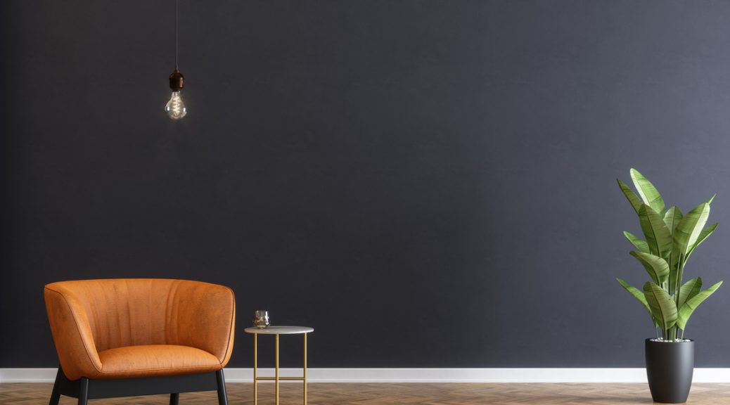 Armchair and coffee table with black wall
