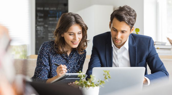 Business people working together at coffee shop