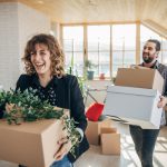 Couple moving in into new apartment