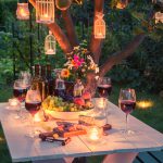 Beautiful table full of cheese and meats in garden